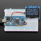 Monochrome 1.3" 128x64 OLED Graphic Display - STEMMA QT / Qwiic