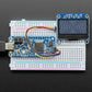 Monochrome 1.3" 128x64 OLED Graphic Display - STEMMA QT / Qwiic